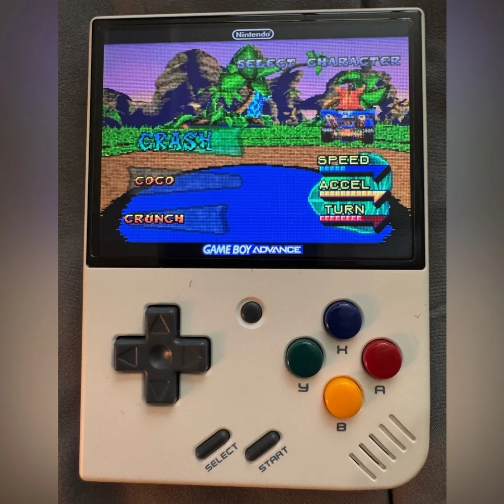 Motion Mini White and Black Handheld Gaming Console with Retro Design